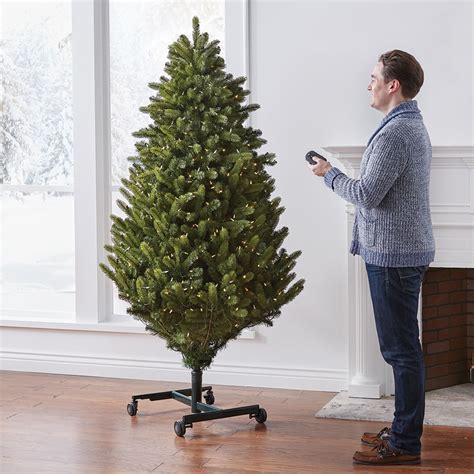 automatic electric self storage boxed christmas tree|hammacher height adjustable christmas tree.